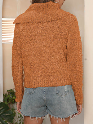 Tangerine textured knit sweater with a shawl collar and pearl buttons.