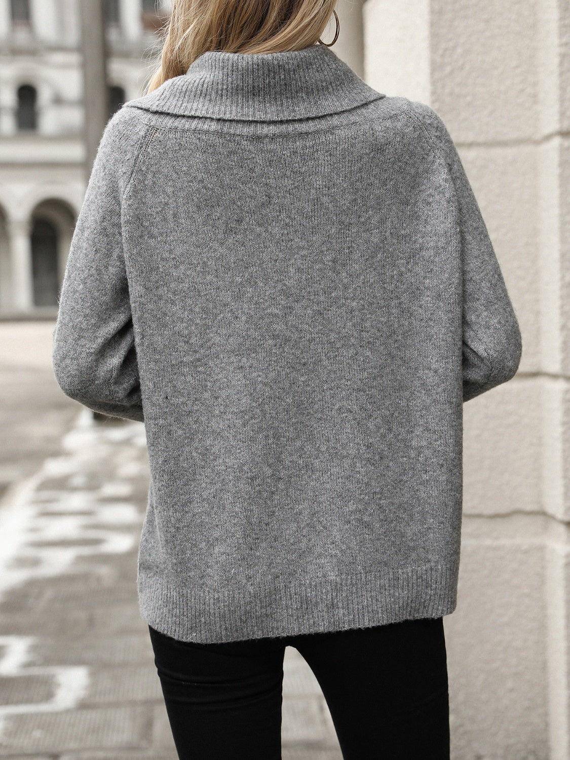 Gray cowl neck knit pullover sweater with ribbed cuffs and hem.