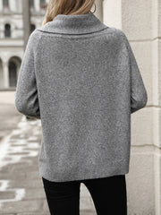 Gray cowl neck knit pullover sweater with ribbed cuffs and hem.