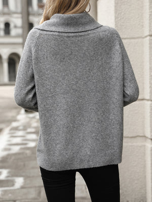 Gray cowl neck knit pullover sweater with ribbed cuffs and hem.