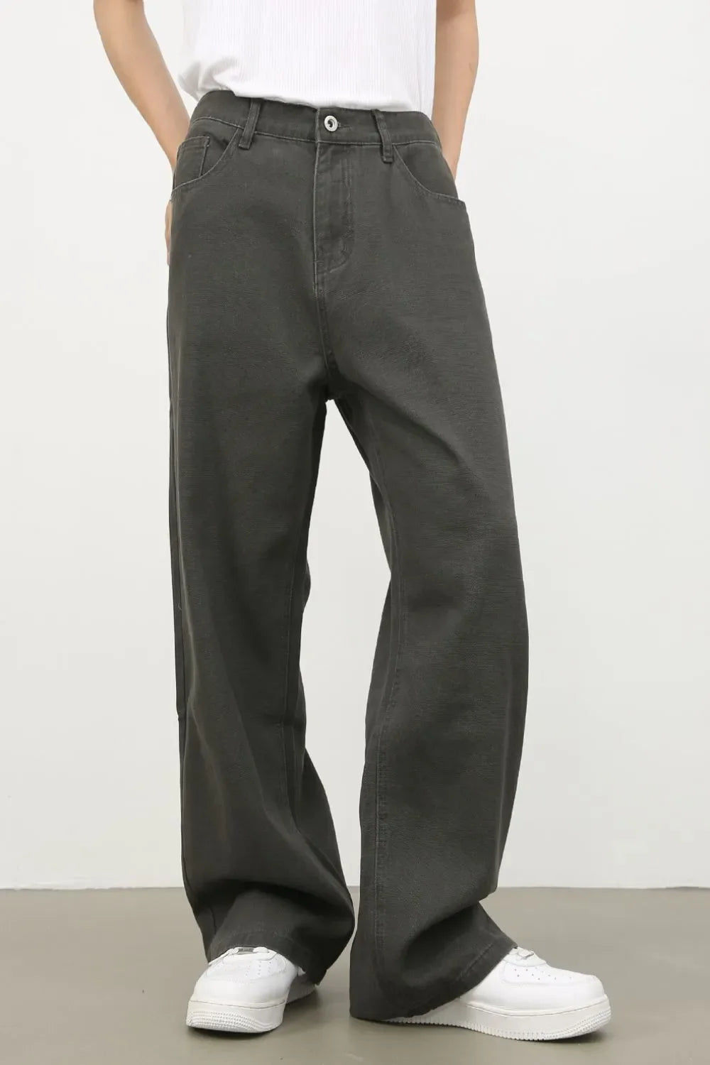 Dark gray wide-leg 100% cotton jeans with elasticated waistband and button closure.