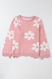 Blush pink knit sweater with white floral appliques and pearl details.