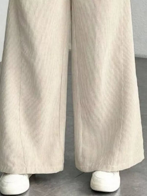 Apricot corduroy wide-leg maternity trousers with a relaxed fit.