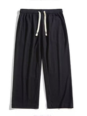 Black drawstring wide leg sweatpants with vertical texture