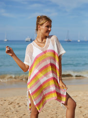 Crochet beach poncho with rainbow stripes, V-neck, short sleeves, and side ties.