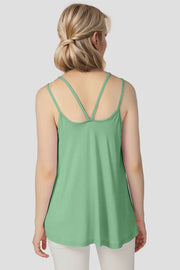 Green trapeze cami with double spaghetti straps and a scoop neckline.
