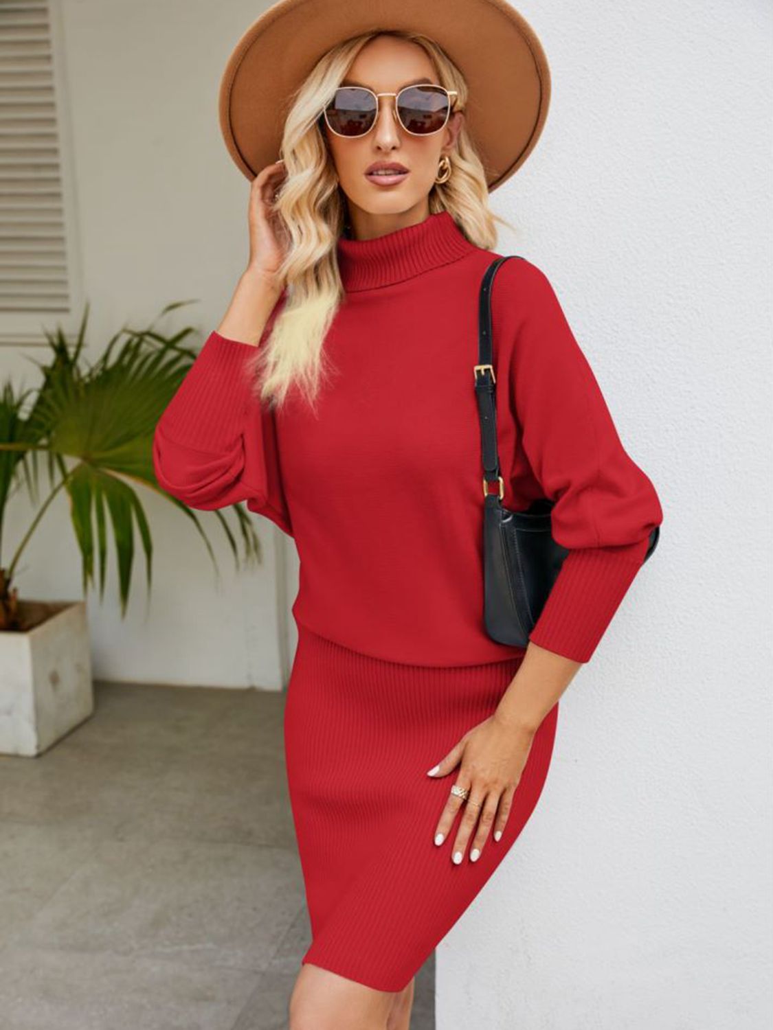 Deep red ribbed knit midi dress with dolman sleeves and a turtleneck.
