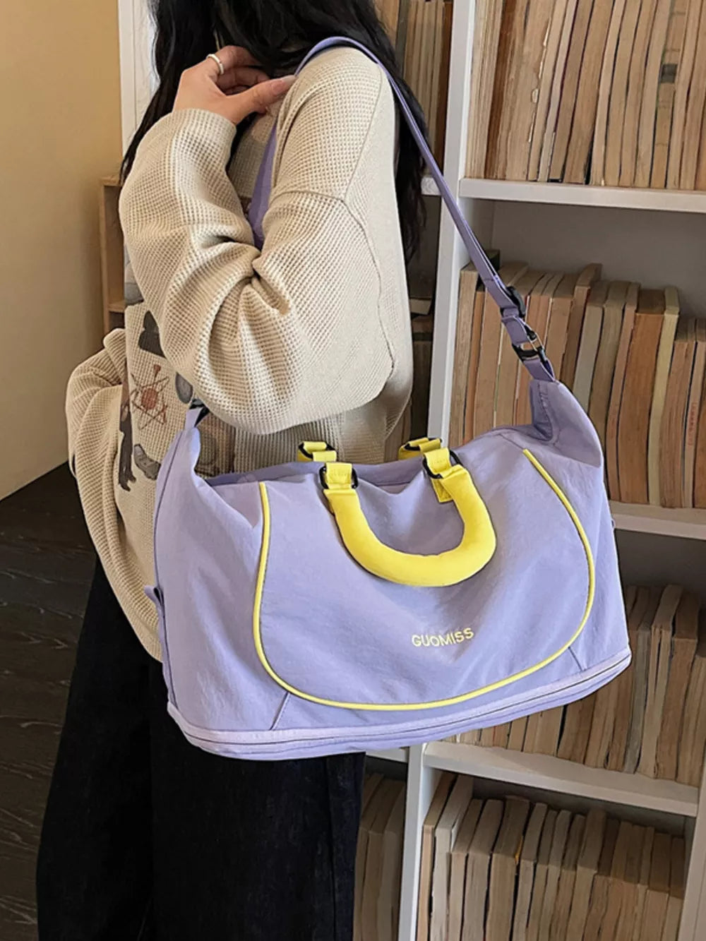 Purple duffle bag with yellow trim and handles, Oxford cloth, gym bag style