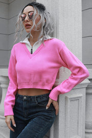Pink cropped v-neck sweater with zip detail and white collar