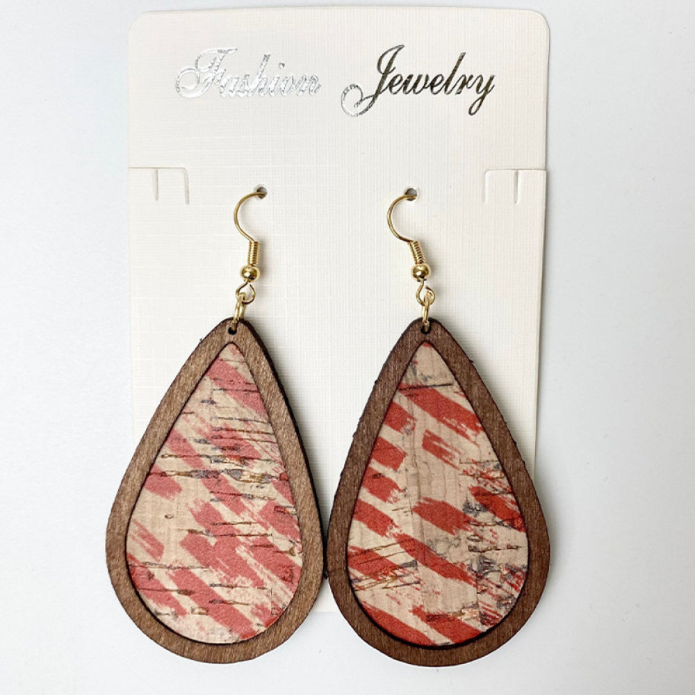 Cork teardrop earrings with red botanical print and wooden frame