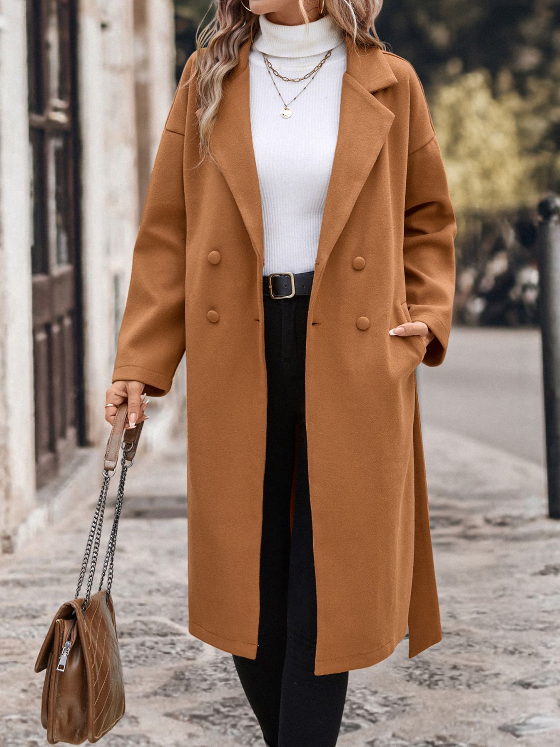 Caramel wool blend wrap coat with double-breasted buttons and side pockets.
