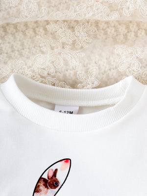 White baby crew neck sweatshirt with a watercolor bunny print and ribbed collar.