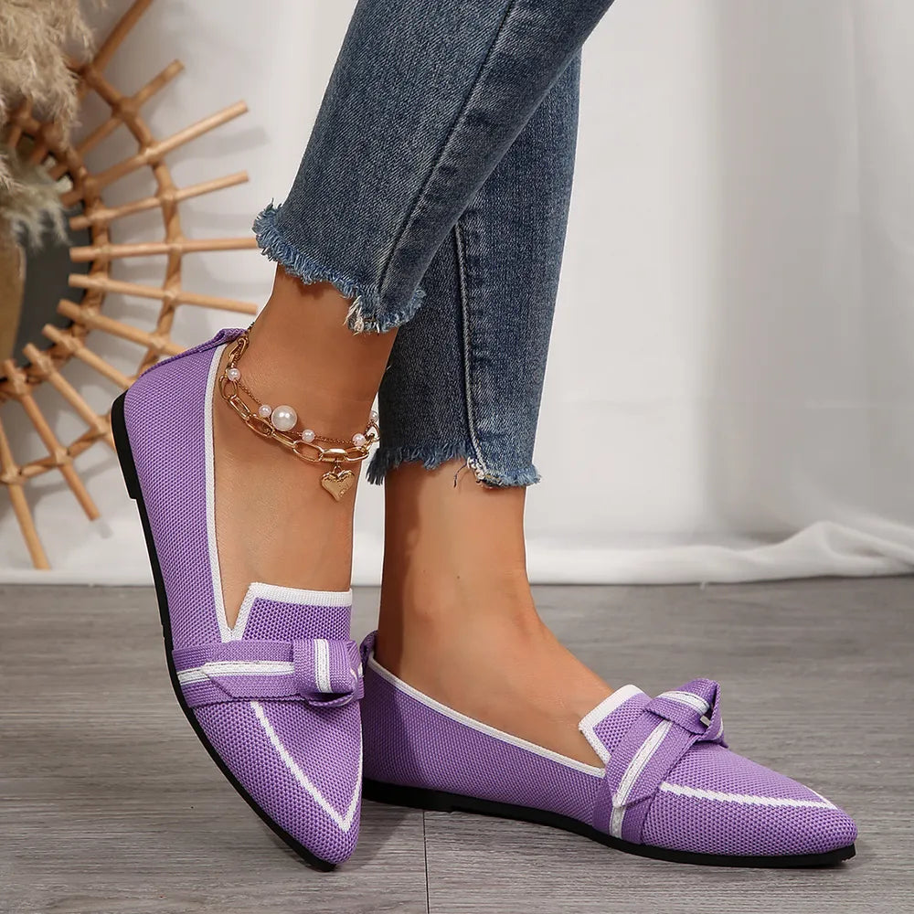 Vivid Violet mesh pointe slip-on flats with white trim and bow detail.