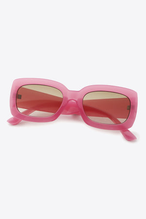 Bubblegum pink acetate rectangular sunglasses with tinted lenses