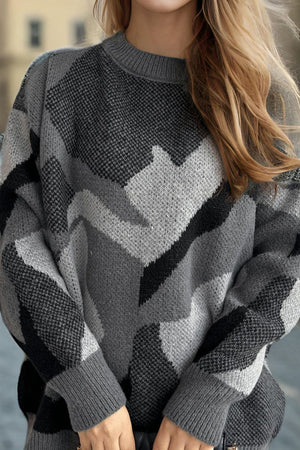 Geometric knit crewneck sweater in gray with colorblock pattern.