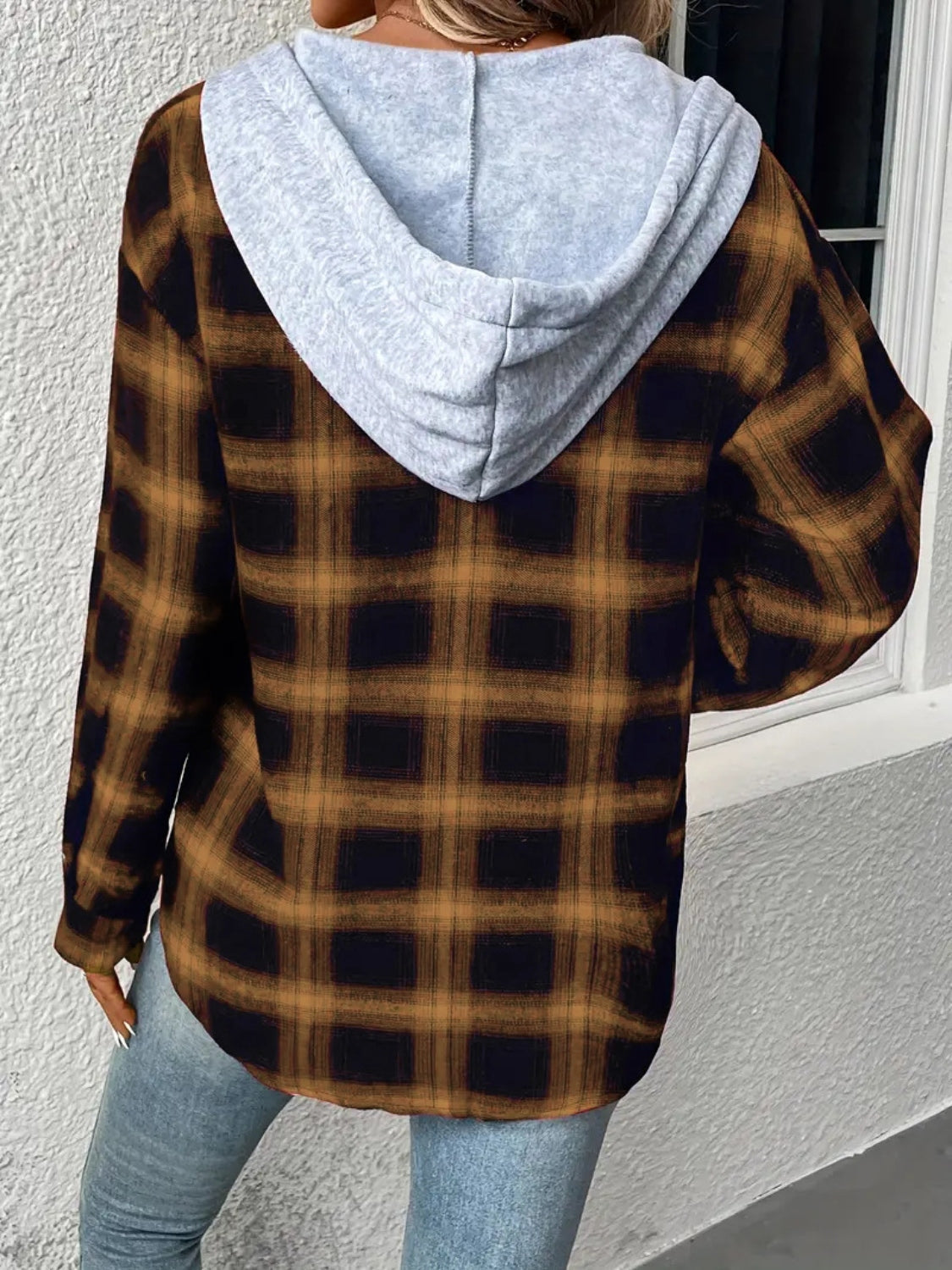 Plaid shirt jacket with contrast grey hood and long sleeves.