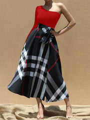 Red one-shoulder midi dress with black plaid skirt and waist tie.