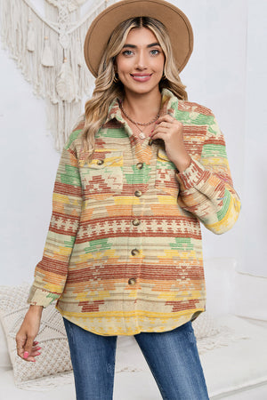 Aztec print shacket in tan with patch pockets and button front, styled with jeans.