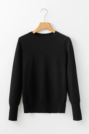 Black crewneck long sleeve knit sweater with ribbed cuffs and hem