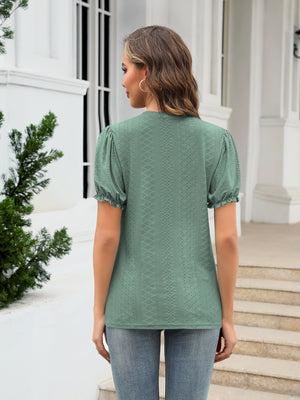 Eyelet puff sleeve v-neck blouse in teal with textured pattern