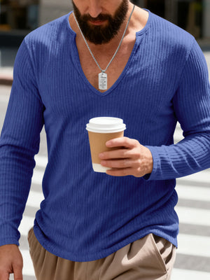 Royal Blue ribbed long sleeve t-shirt with deep V-neck, worn by a man holding a coffee cup.