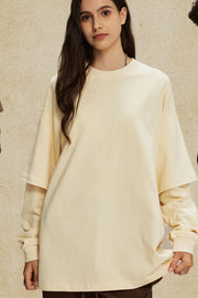 Beige oversized tee with layered long sleeves and crew neck