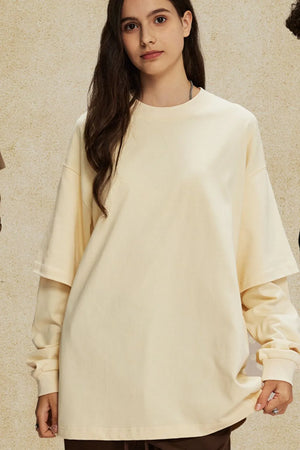 Beige oversized tee with layered long sleeves and crew neck