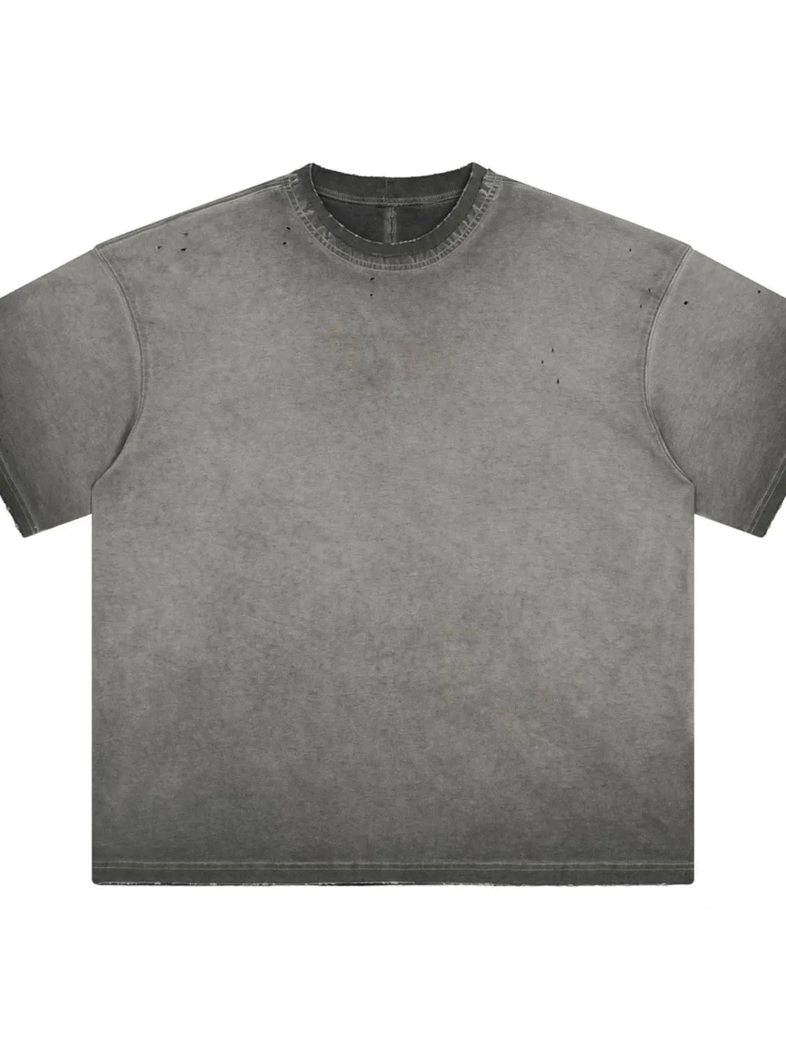Distressed oversized gray washed effect t-shirt with raw hem and neckline.