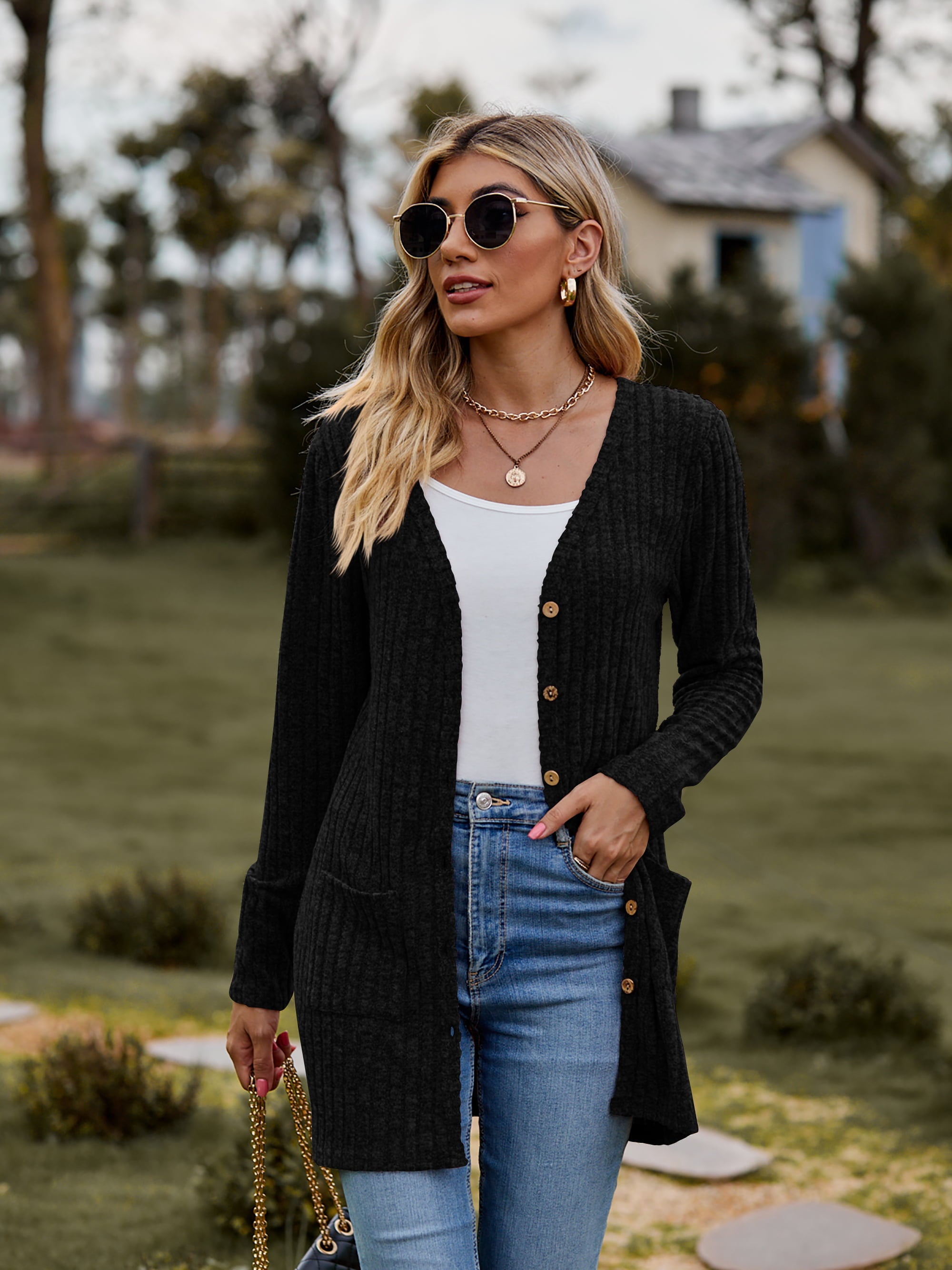 Black longline ribbed knit button-down cardigan with pockets.