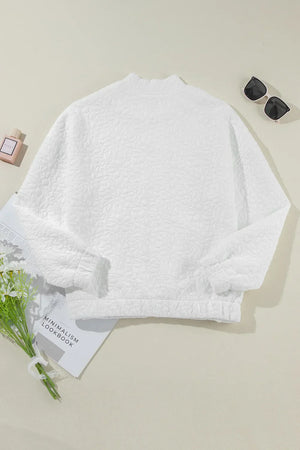 White quilted bomber jacket with mock neck and elastic cuffs and hem
