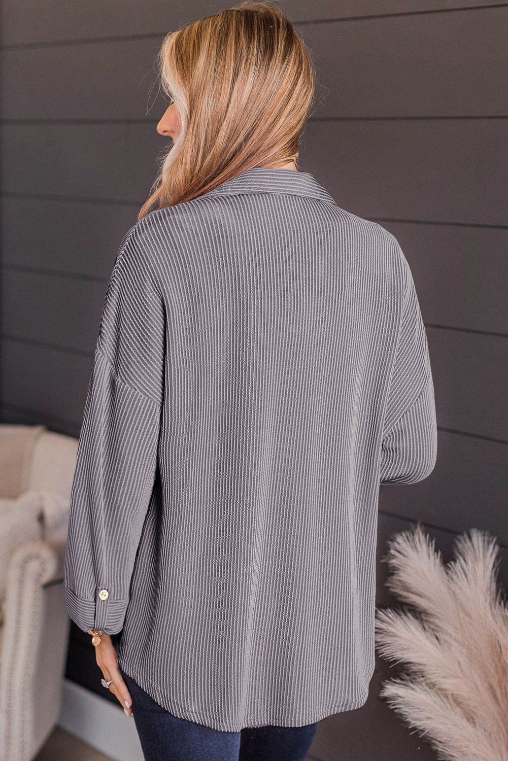 Gray textured stripe overshirt with oversized fit and button cuff detail.