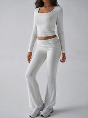 Light gray loungewear set with square neck long sleeve crop top and flared pants