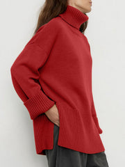 Deep Red ribbed turtleneck sweater with flared sleeves and cuffed wrists.