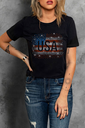 Black t-shirt with USA rhinestone graphic and American flag detail.