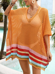 Orange crochet beach cover-up with rainbow stripe hem and V-neck