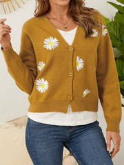 Mustard V-neck cardigan with daisy embroidery and button front.