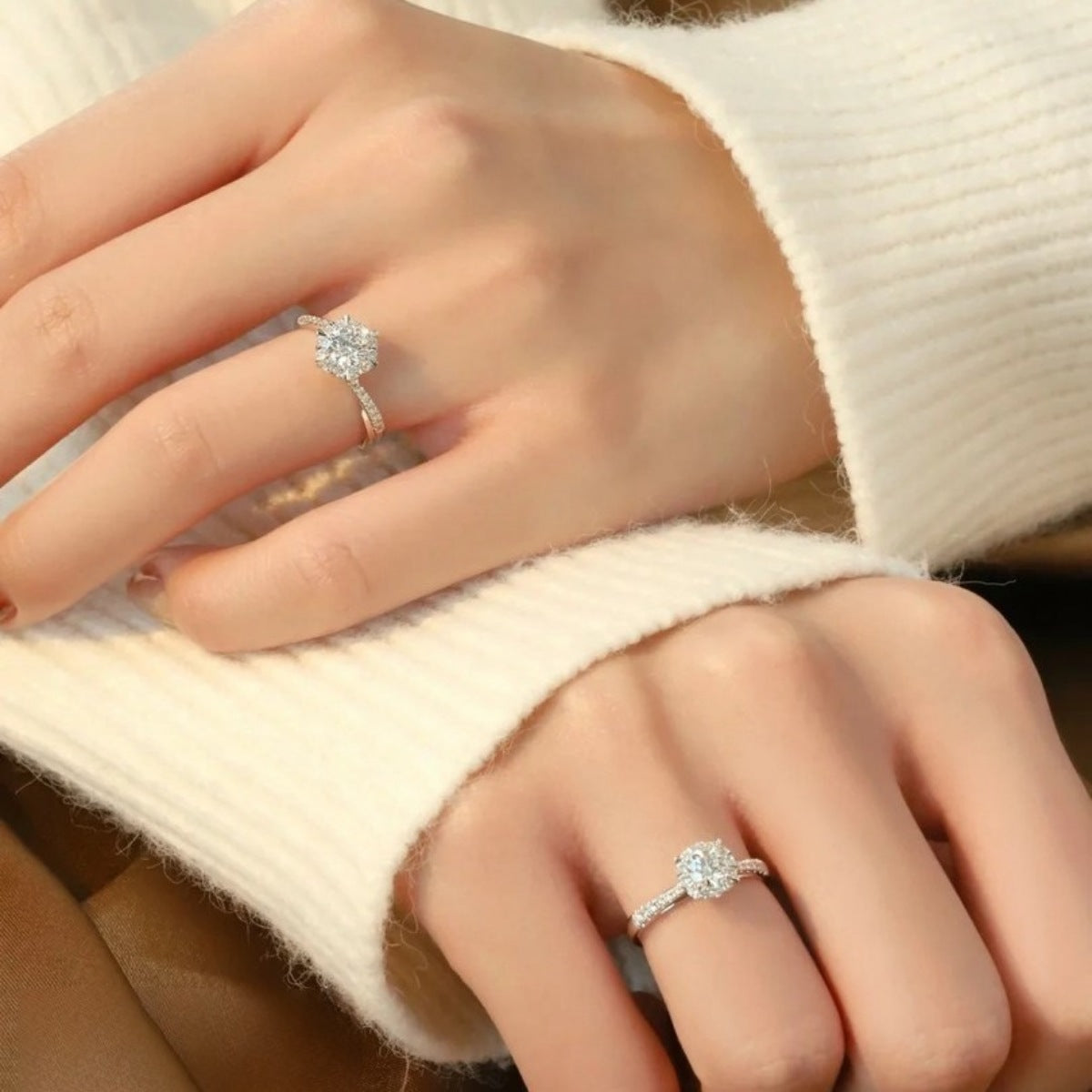 Sterling silver ring with brilliant moissanite center stone and pave band.