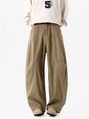Men's taupe wide-leg sweatpants with panel detailing and a relaxed fit.
