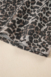 Leopard print denim mini skirt with visible stitching detail