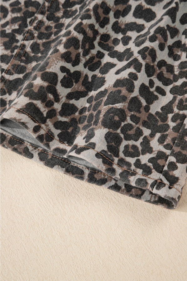 Leopard print denim mini skirt with visible stitching detail