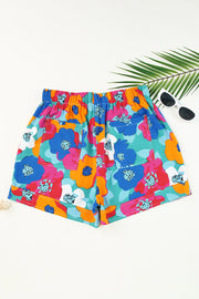 Multicolor floral print drawstring shorts with pockets.