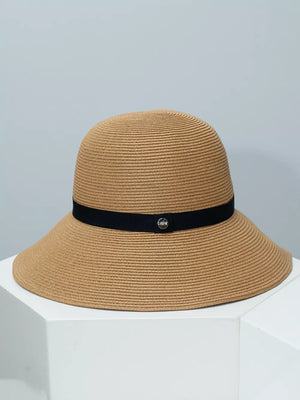 Charming straw sun hat in khaki with elegant black ribbon and silver detail