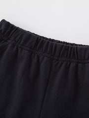 Black cotton toddler pants with elastic waistband detail