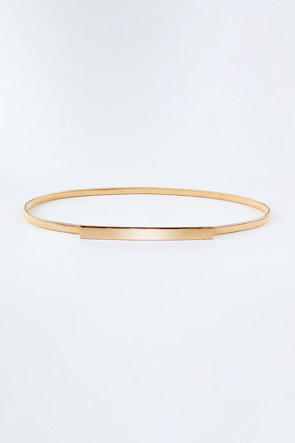 Slimline gold-tone metal waist belt with a polished rectangular buckle.