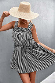 Black striped mini dress with ruffle yoke and tiered skirt.