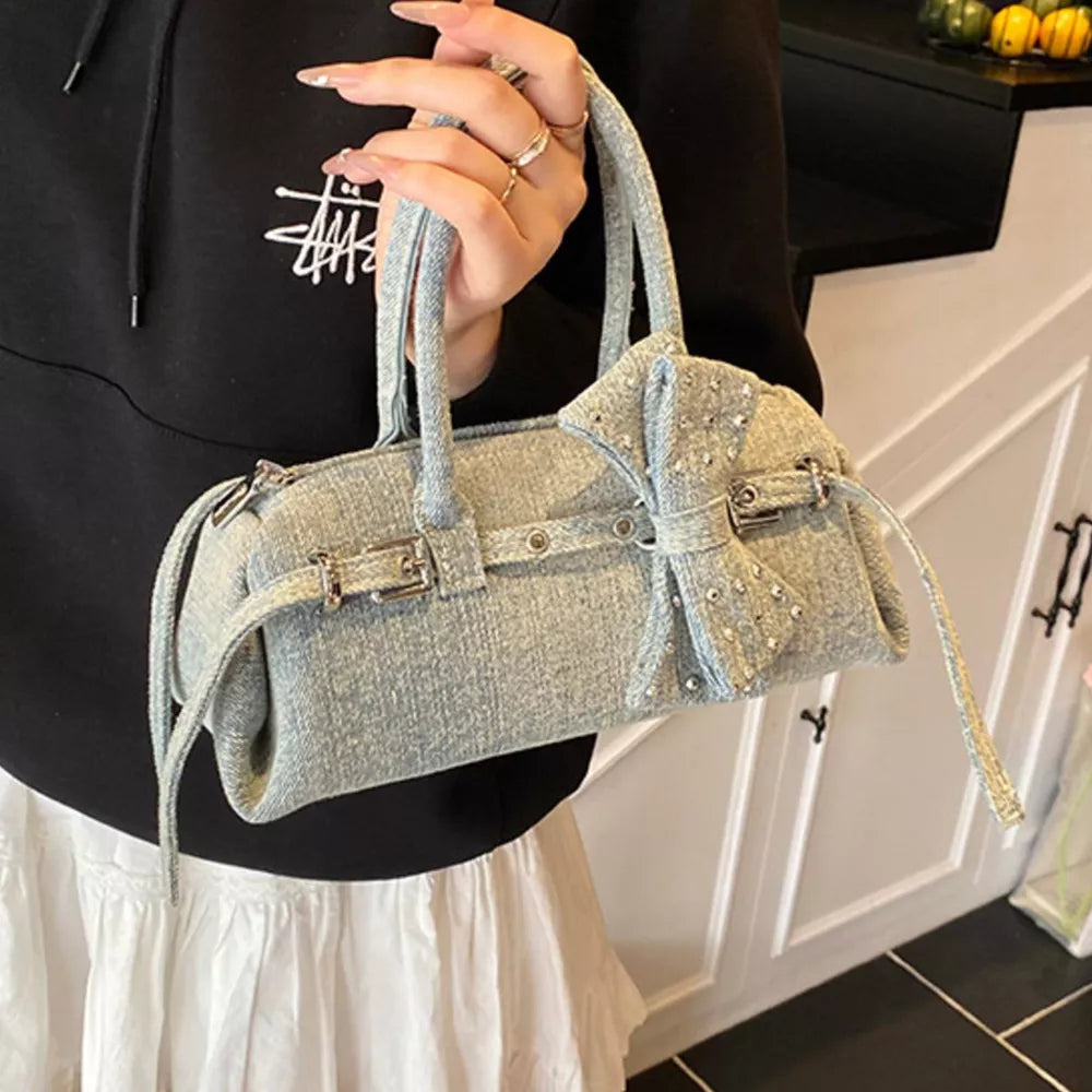 Denim Bow Accent Crossbody Bag in Blue, front view