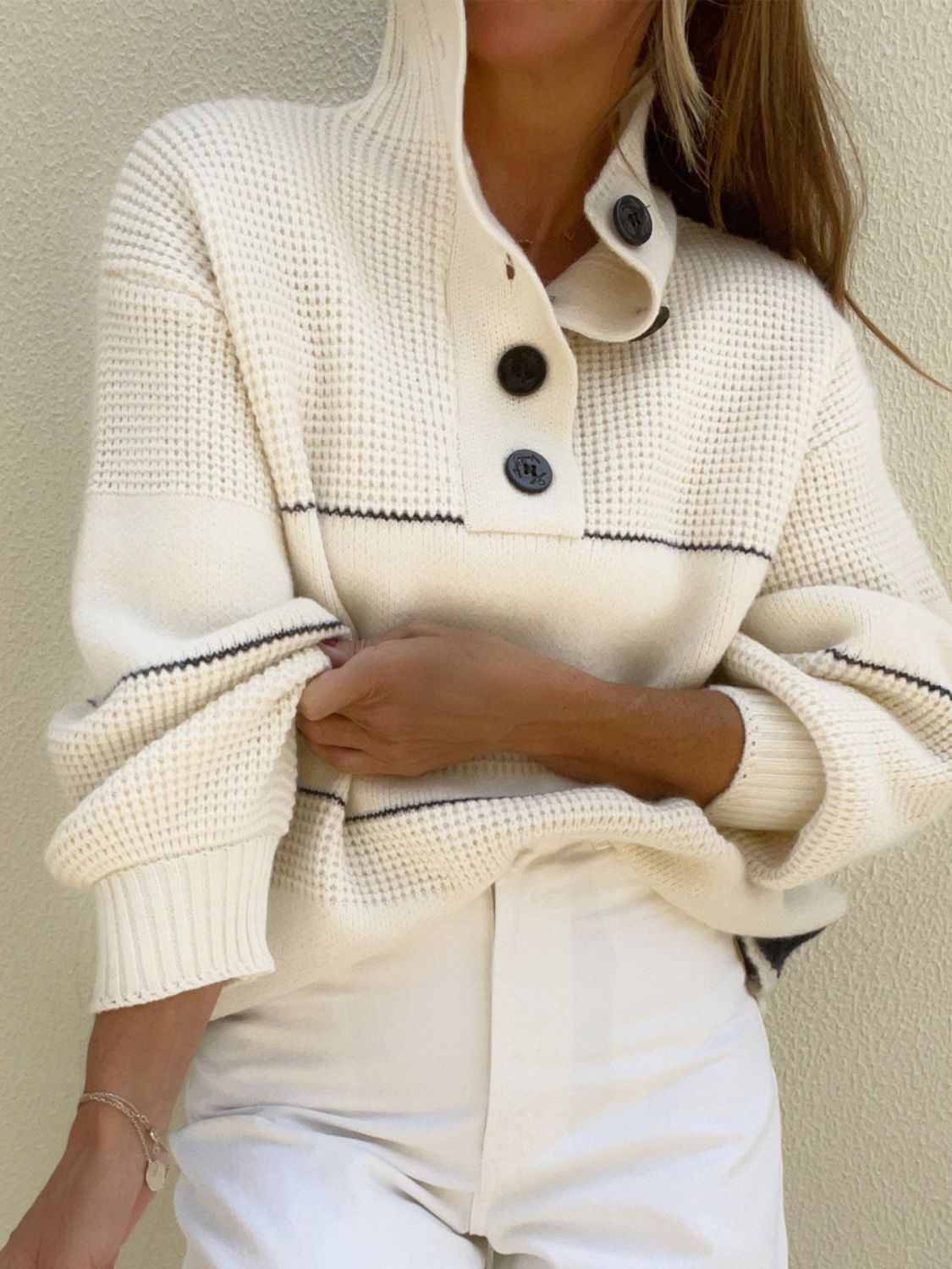 Cream waffle knit button-up collar sweater with black stripe detail