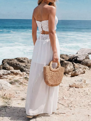 White crochet bandeau top and maxi skirt set with lace-up back detail.