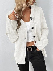 White ribbed knit hooded cardigan with button front and long sleeves.