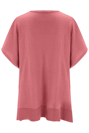 Relaxed V-neck knit poncho top in Dusty Pink with short sleeves and ribbed hem.